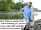 A Des Moines Water Works employee takes samples from a nearby river for analysis. The regional water utility delivers drinking water to more than 500,000 Iowans. AP Photo/Charlie Neibergall